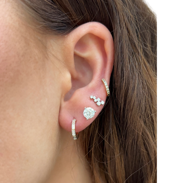 Lab-Grown Dainty Baguette Huggies in ear
