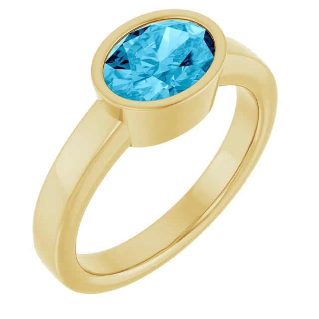 Oval Aquamarine Bezel Set Ring