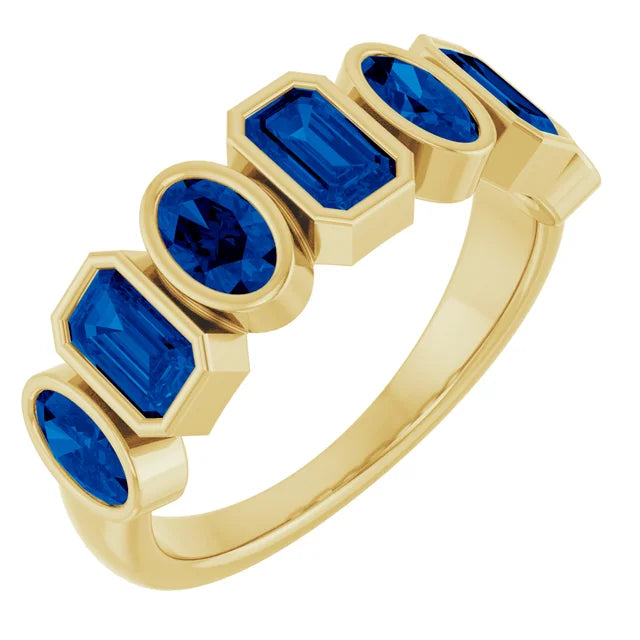 Bezel Set Oval and Emerald Cut Sapphire Band