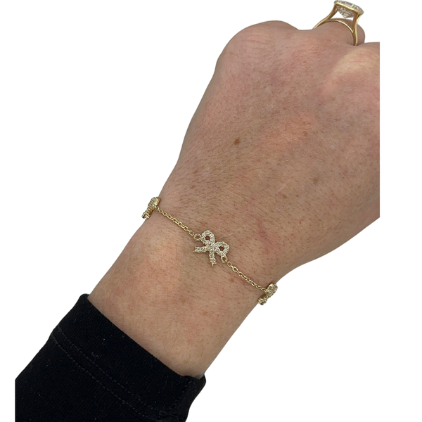 Triple Diamond Bow Adjustable Chain Bracelet on wrist