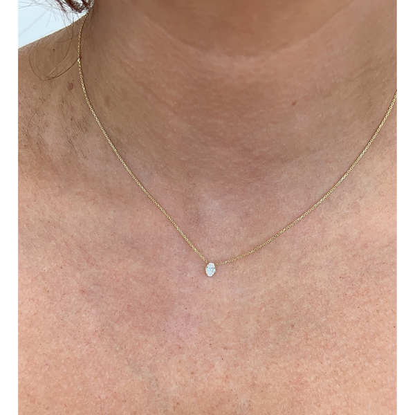 Oval Diamond Pendant Necklace on neck