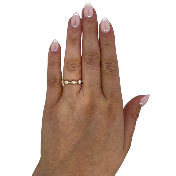7 Stone Spaced Floating Diamond Band