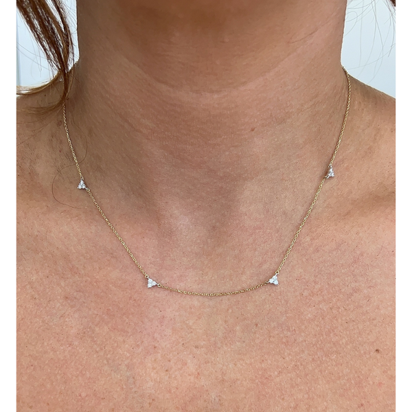 Round Tri-Stone Diamond Necklace on neck