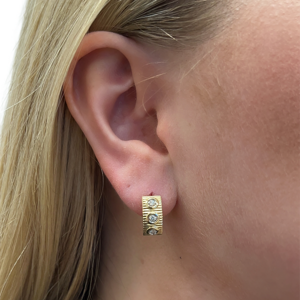 Textured Bezel Huggies in ear